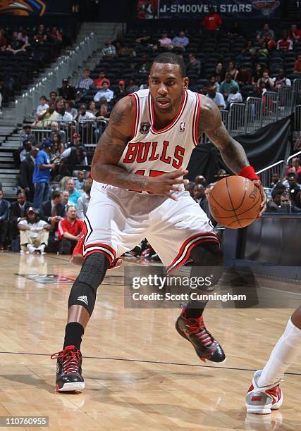 Rasual Butler of the Chicago Bulls handles the ball during the game against the Atlanta Hawks on March 22, 2011 at Philips Arena in Atlanta, Georgia....