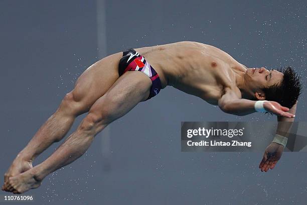 Qin Kai of China in action during a training session ahead of the FINA/Midea Diving World Series 2011-Beijing at the National Aquatics Center on...