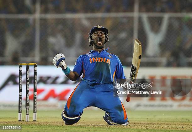 Yuvraj Singh of India celebrates hitting the winning runs during the 2011 ICC World Cup Quarter Final match between Australia and India at Sardar...