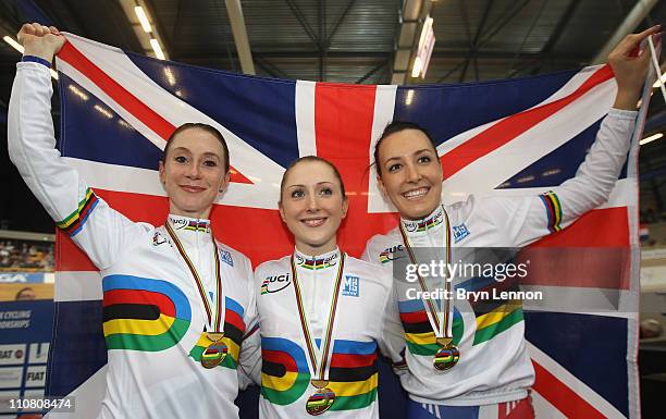 Team GB Women's Pursuit Team of Wendy Houvenaghel, Laura Trott and Danielle King celebrate winning the gold medal in the Women's Team Pursuit during...