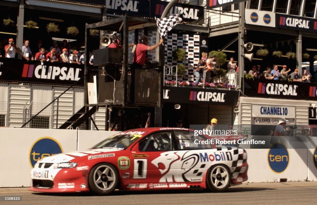 Clipsal Racing Jacket Mark Skaife of the Holden Racing Team takes the chequered flag,... News ...