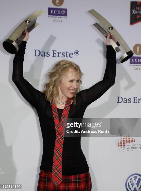 Annette Humpe poses with her award during the Echo award 2011 at Palais am Funkturm on March 24, 2011 in Berlin, Germany.