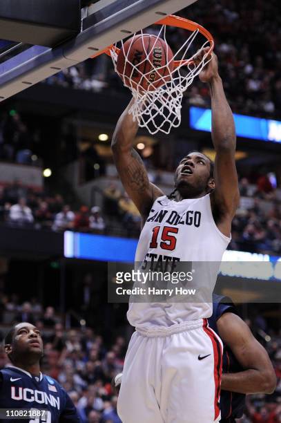 Kawhi Leonard of the San Diego State Aztecs dunks the ball against the Connecticut Huskies during the west regional semifinal of the 2011 NCAA men's...