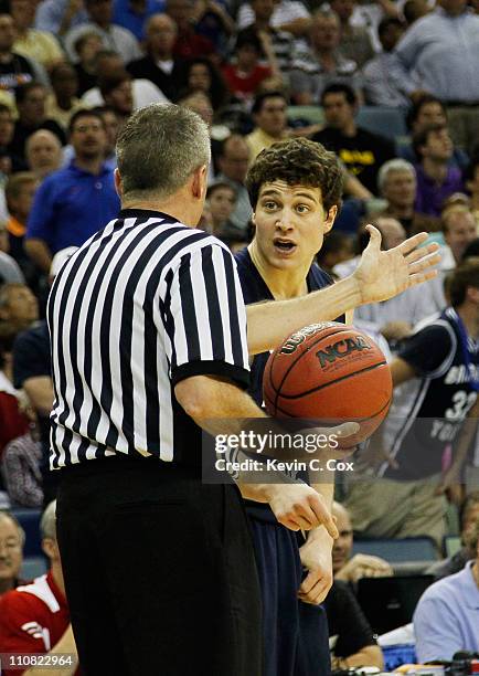 Jimmer Fredette of the Brigham Young Cougars reacts while talking to an official during their game against the Florida Gators in the Southeast...