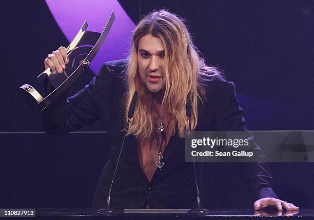 Violinist David Garrett speaks after receiving his National Male Artist Rock/Pop Award at the Echo Awards 2011 at Palais am Funkturm on March 24,...
