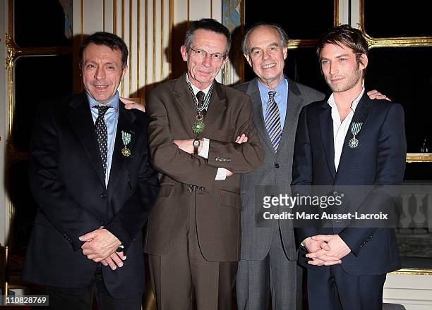 Jean-Marie Boursicot, Patrice Leconte, French culture Minister Frederic Mitterrand and Ora Ito pose together after being awarded Chevalier des Arts...