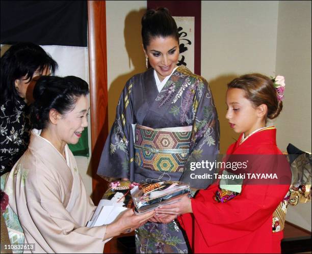 Jordan'S H.M - Queen Rania And H.R.H Princess Iman In Tokyo, Japan On December 22, 2006 - Jordan's Princess Iman dressed in kimono receives hagoitas...