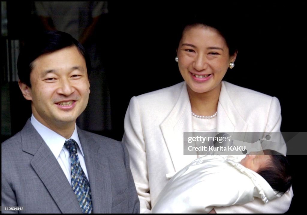 Crown Prince Naruhito And Crown Princess Masako As The Royal Couple Leaves The Imperial Hospital With Their Infant Daughter Princess Aiko In Tokyo, Japan On December 08, 2001.