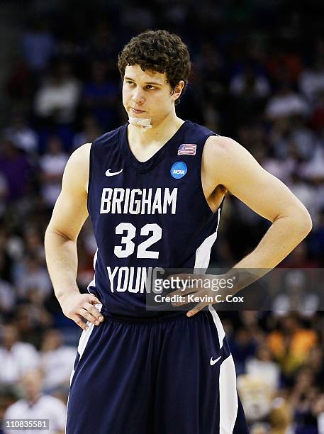 Jimmer Fredette of the Brigham Young Cougars reacts during their 74 to 83 loss to the Florida Gators in the Southeast regional of the 2011 NCAA men's...