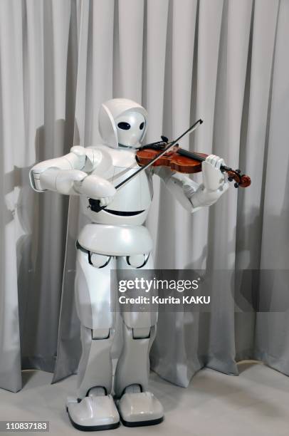 Toyota Motor Corporation President Katsuaki Watanabe'S Announcement Two New Robots, Japan On December 06, 2007 - Toyota Unveils Personal-transport,...