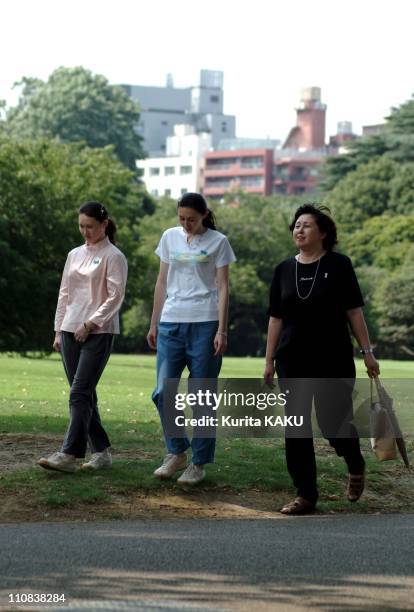 Wife Of Accused Us Army Deserter Charles Jenkins, Hitomi Soga And Children Strolling In Tokyo, Japan On July 23, 2004 - Wife of accused US army...