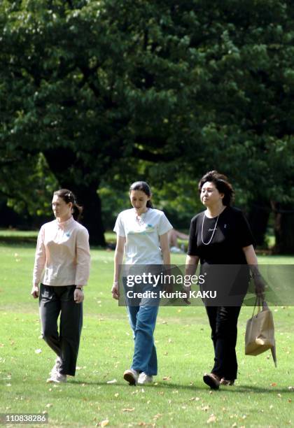 Wife Of Accused Us Army Deserter Charles Jenkins, Hitomi Soga And Children Strolling In Tokyo, Japan On July 23, 2004 - Wife of accused US army...