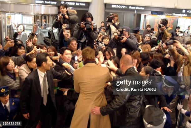Ocean'S Twelve Stars Arrive In Japan On January 12, 2005 - Brad Pitt arrived at Narita Airport, greeted by fans waiting outside the terminal - It is...