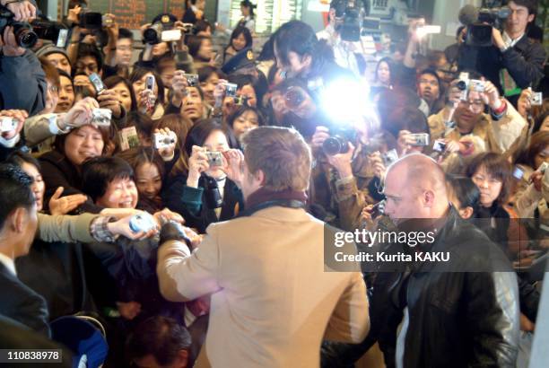 Ocean'S Twelve Stars Arrive In Japan On January 12, 2005 - Brad Pitt arrived at Narita Airport, greeted by fans waiting outside the terminal - It is...
