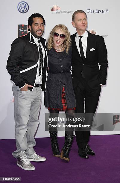 Adel Tawil, Annette Humpe and Max Raabe arrive for the Echo award 2011 at Palais am Funkturm on March 24, 2011 in Berlin, Germany.