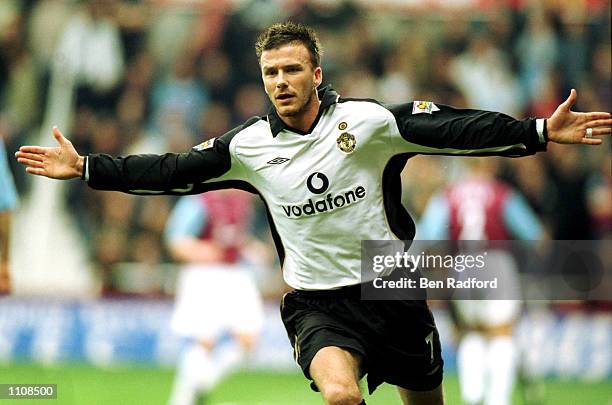 David Beckham of Manchester United celebrates scoring a goal during the FA Barclaycard Premiership match between West Ham United and Manchester...