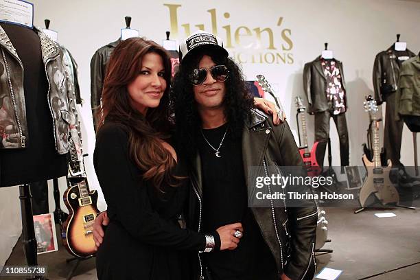 Slash and wife Perla Hudson host an exclusive VIP gala preview at the Julien's Auctions Gallery on March 24, 2011 in Beverly Hills, California.