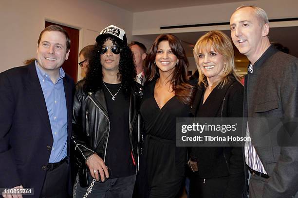 Slash and wife Perla Hudson host an exclusive VIP gala preview at the Julien's Auctions Gallery on March 24, 2011 in Beverly Hills, California.