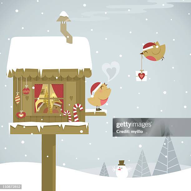 christmas party  of the robins family at home - two animals stock illustrations