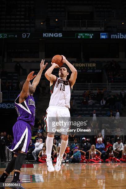 Carlos Delfino of the Milwakee Bucks shoots the ball against the Sacramento Kings on on March 23, 2011 at the Bradley Center in Milwaukee, Wisconsin....
