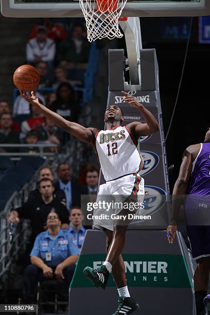 Luc Mbah a Moute of the Milwakee Bucks moves the ball against the Sacramento Kings on on March 23, 2011 at the Bradley Center in Milwaukee,...