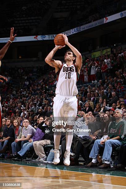 Carlos Delfino of the Milwakee Bucks shoots the ball against the Sacramento Kings on on March 23, 2011 at the Bradley Center in Milwaukee, Wisconsin....