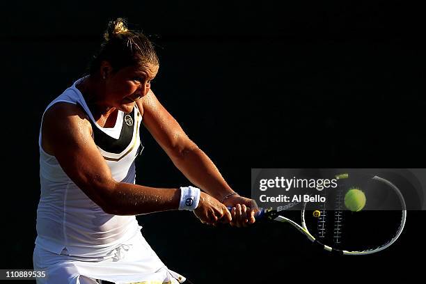 Dinara Safina of Russia hits a forehand return against Vera Zvonareva of Russia during the Sony Ericsson Open at Crandon Park Tennis Center on March...