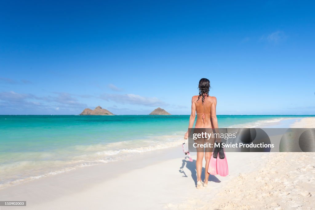 Woman on beach, Hawaii