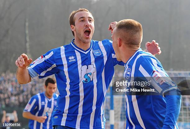Glenn Murray of Brighton celebrates after scoring with team mate Craig Noone during the npower League One match between Brighton & Hove Albion and...