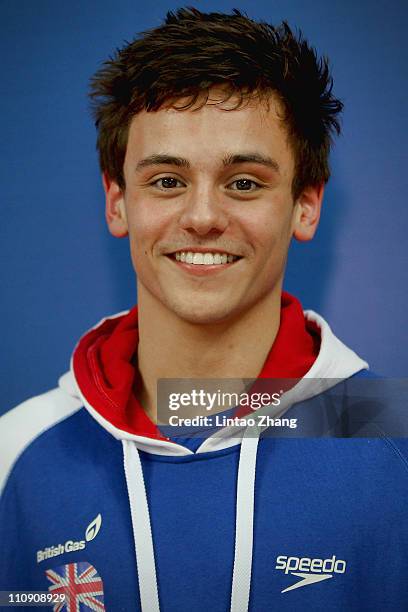 Tom Daley of Great Britain looks on during the Men's 10m Platform semi- Final during the FINA Diving World Series at the Beijing National Aquatics...