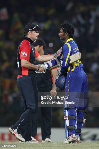 Andrew Strauss captain of England shakes hands with Upul Tharanga after Sri Lanka's ten wicket victory during the 2011 ICC World Cup Quarter-Final...