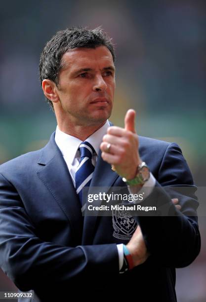 Gary Speed the manager of Wales gestures prior to kickoff during the UEFA EURO 2012 Group G qualifying match between Wales and England at the...