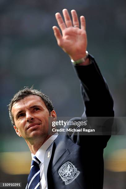 Gary Speed the manager of Wales waves to the fans prior to kickoff during the UEFA EURO 2012 Group G qualifying match between Wales and England at...