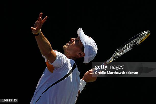 Andreas Seppi of Italy serves against Alexandr Dolgopolov of the Ukraine during the Sony Ericsson Open at Crandon Park Tennis Center on March 26,...