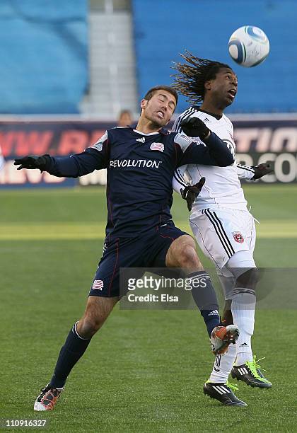 Joseph Ngwenya of DC United and A.J. Soares of the New England Revolution fight for the ball on March 26, 2011 at Gillette Stadium in Foxboro,...
