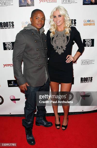 Actor Sam Jones III and Playboy playmate Karissa Shannon arrive at the Hollywood music showcase and fundraiser benefiting American Red Cross relief...