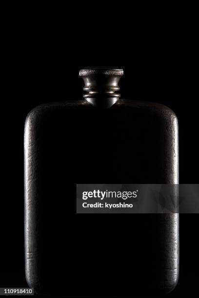 isolated shot of hip-flask on black background - drinking flask stock pictures, royalty-free photos & images