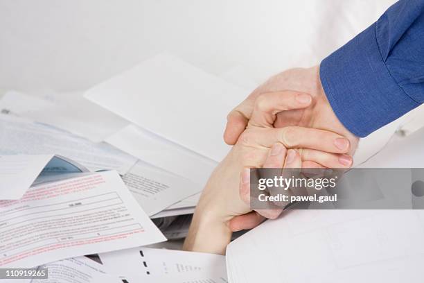 financial aid - drowning stock pictures, royalty-free photos & images