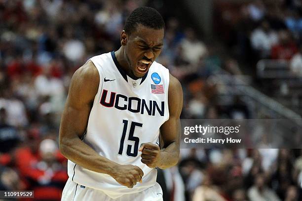 Kemba Walker of the Connecticut Huskies celebrates after a play towards the end of the game against the Arizona Wildcats during the west regional...