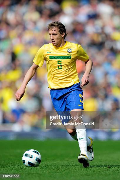 Lucas Leiva of Brazil runs with the ball during the International friendly match between Brazil and Scotland at Emirates Stadium on March 27, 2011 in...