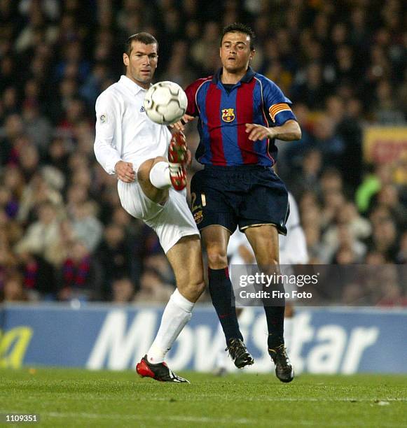 Zinedine Zidane of Real Madrid and Luis Enrique of Barcelona in action during the Primera Liga match between Barcelona and Real Madrid, played at the...