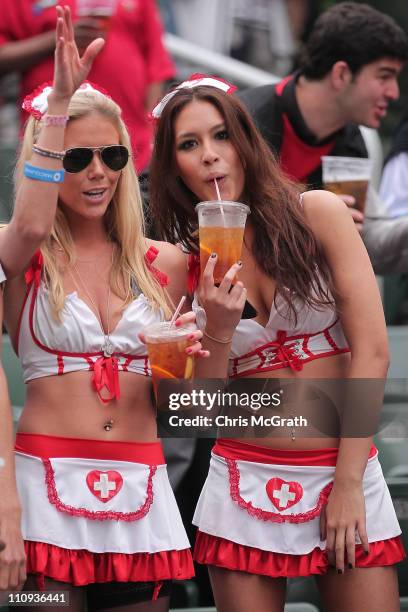 Fans enjoy the atmosphere and support their teams in the south stand during day three of the IRB Sevens at Hong Kong Stadium on March 27, 2011 in So...