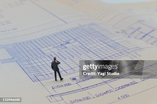 Mini Drawing Man Drawing And A Miniature Man High-Res Stock Photo - Getty Images
