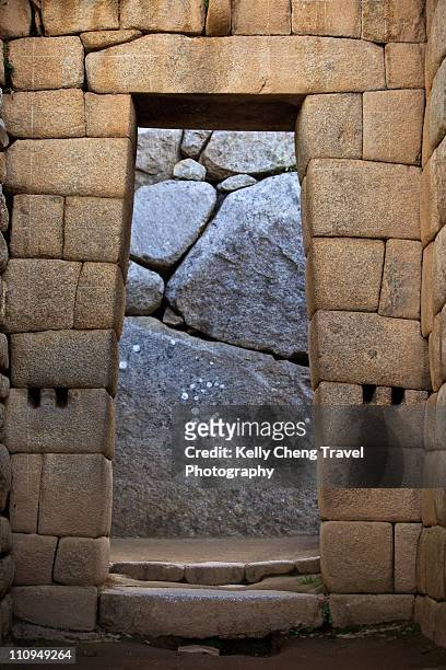 inca doorway in machu picchu - trapezoid stock pictures, royalty-free photos & images