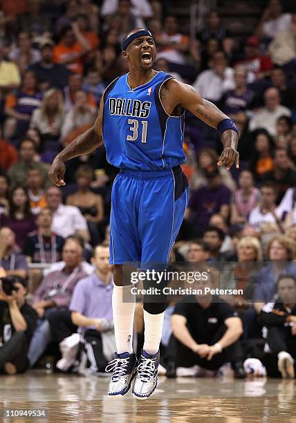 Jason Terry of the Dallas Mavericks celebrates after hitting a three point shot against the Phoenix Suns during the NBA game at US Airways Center on...