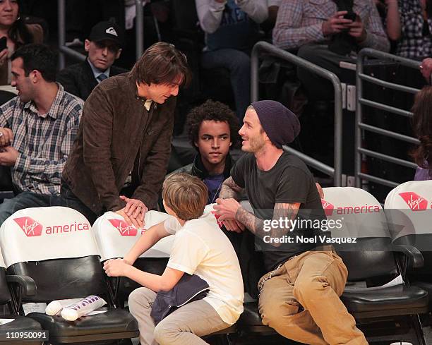 Tom Cruise, Brooklyn Beckham, Connor Cruise and David Beckham attend a game between the New Orleans Hornets and the Los Angeles Lakers at Staples...