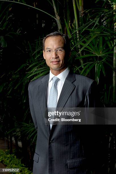 Korn Chatikavanij, Thailand's Minister of Finance, stands for a photograph during Thailand Focus 2011 in Bangkok, Thailand, on Monday, March 28,...