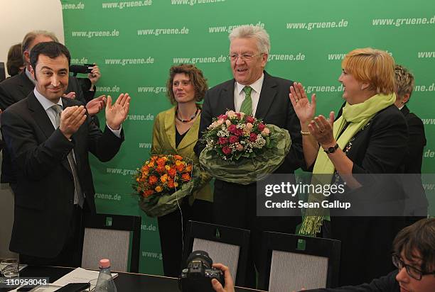 German Greens Party co-chairman Cem Oezdemir and co-chairwoman Claudia Roth welcome Greens Party candidate in the state of Rhineland-Palatinate...