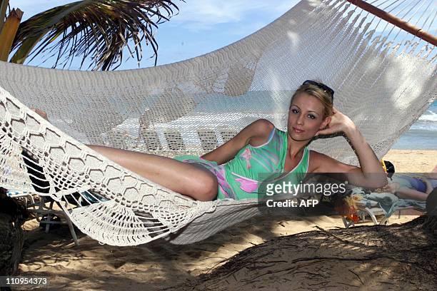 Elodie Gossuin, Miss France 2001, relaxes in a hammock at The Westin Rio Mar Beach Resort, Country Club and Ocean Villas in Rio Grande, Puerto Rico...