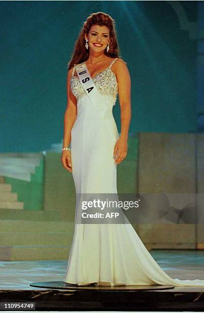 Ali Landry, 22 and representing the US at the 1996 Miss Universe Pageant, appears in front of judges during the evening gown portion of the 1996 Miss...